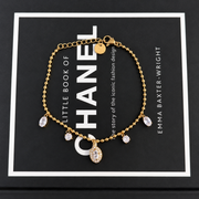 Armband met steentjes en ovale bedel – goudkleurig – productfoto