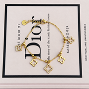 Armband met klaverbedels – goudkleurig – productfoto