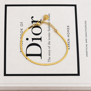 Armband met platte schakels – goudkleurig – productfoto