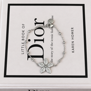 Armband met bloem en steentjes – zilverkleurig – productfoto