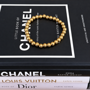 Armband met bolletjes – goudkleurig, productfoto