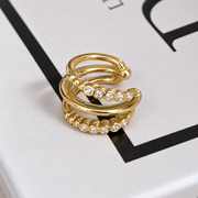 Earcuff met drie lijnen en steentjes – goudkleurig productfoto